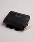 <P>Flower Laser Cut Zip Purse</P>